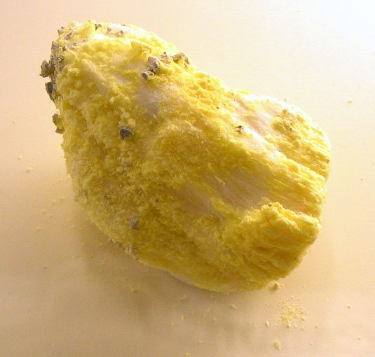 Sassolite (boric acid)in the Natural History Museum, London. Photo by By Aram Dulyan (2006) in the public domain via Wikimedia Commons